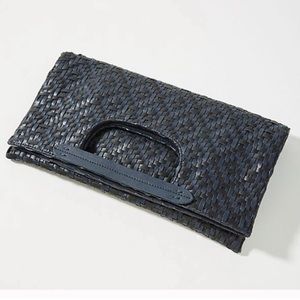 Anthropologie cara woven fold over clutch